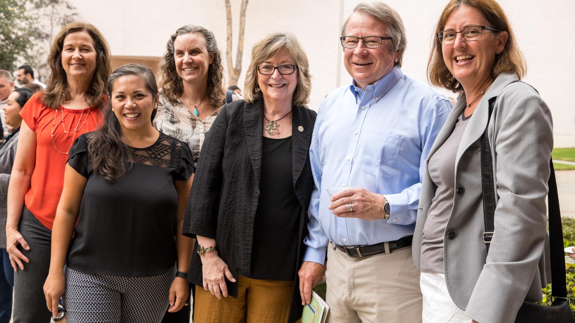 President Conoley with staff members