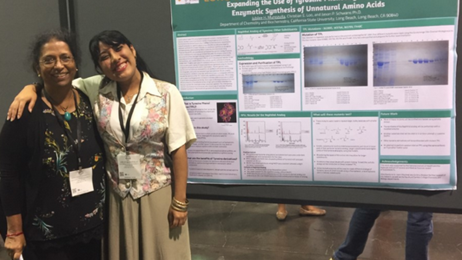 Dr. Vas, MARC Director, (left) and myself next to my poster at ABRCMS where I presented my research.