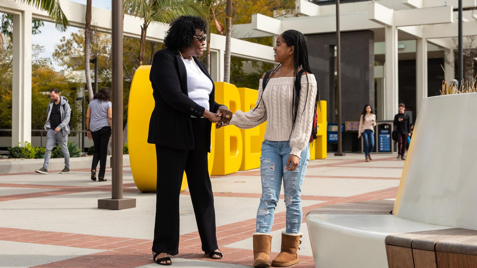 Naomi Rainey-Pierson with student Naomi Rainey-Pierson with student