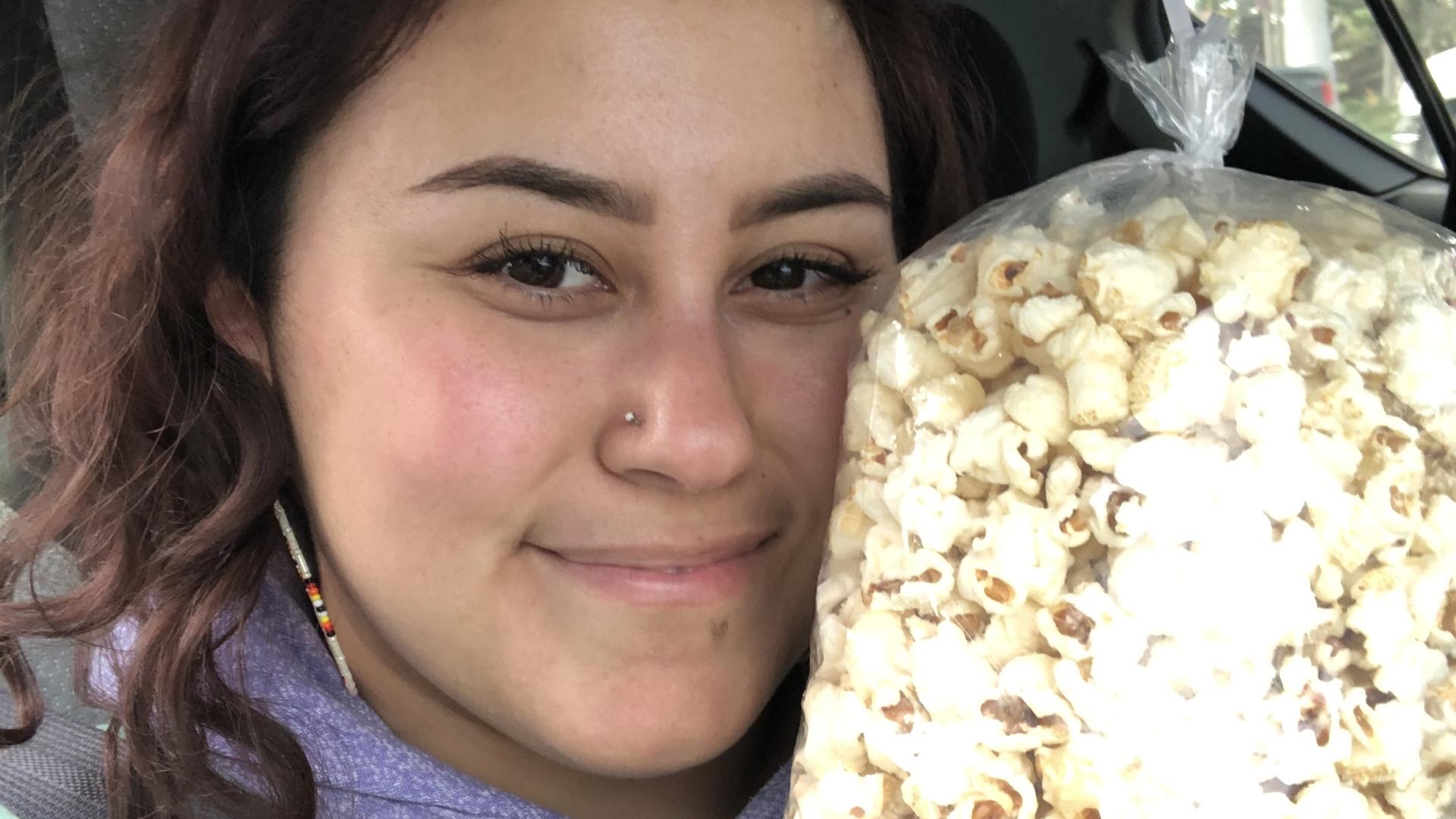 photo of me with kettlecorn that I bought during the Pow Wow held at CSULB