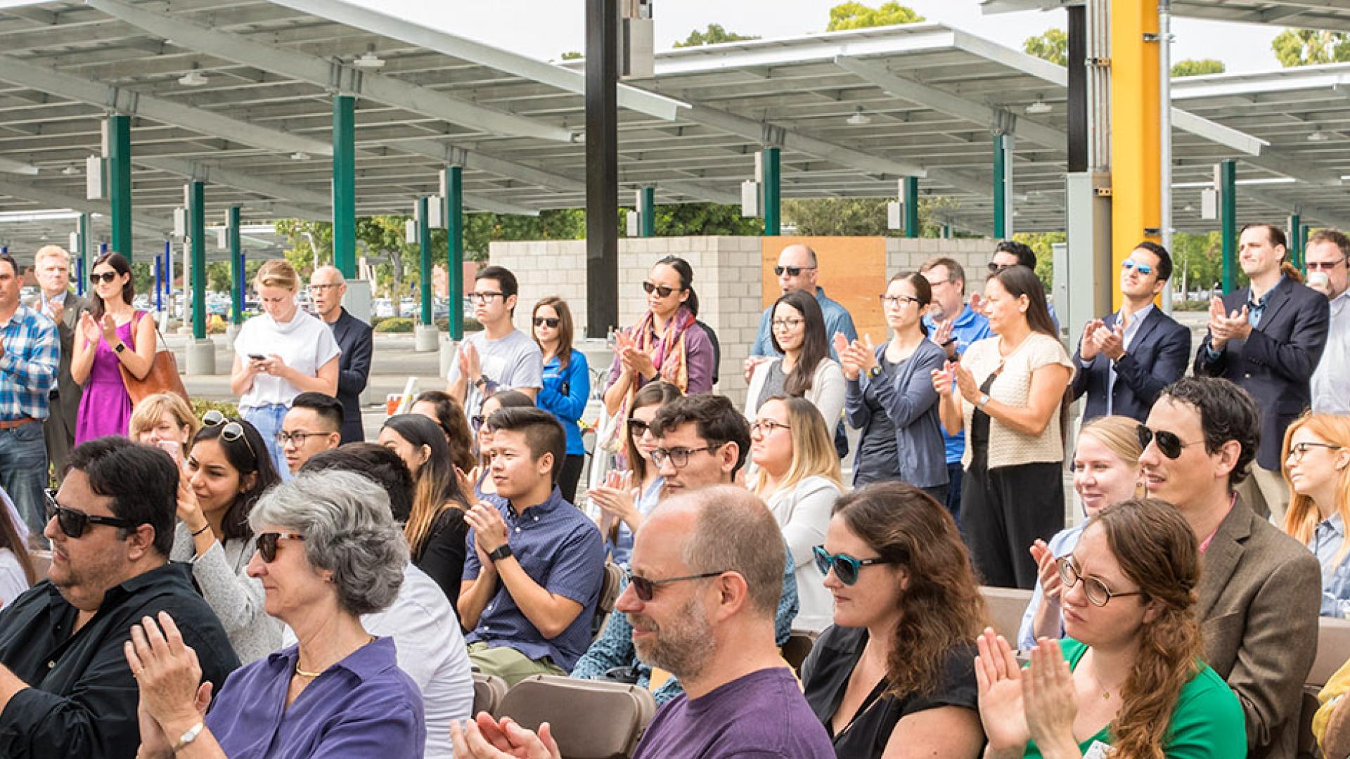 audience at solar panel unveiling