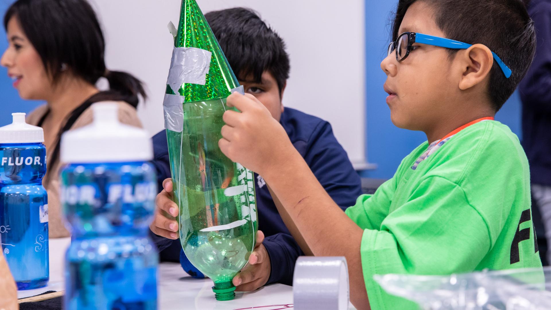 Boys build rockets at STEM camp