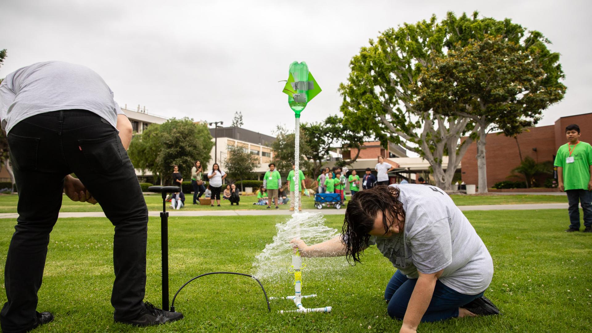 Rockets spray water on Dr. Maiorca Rockets spray water on student