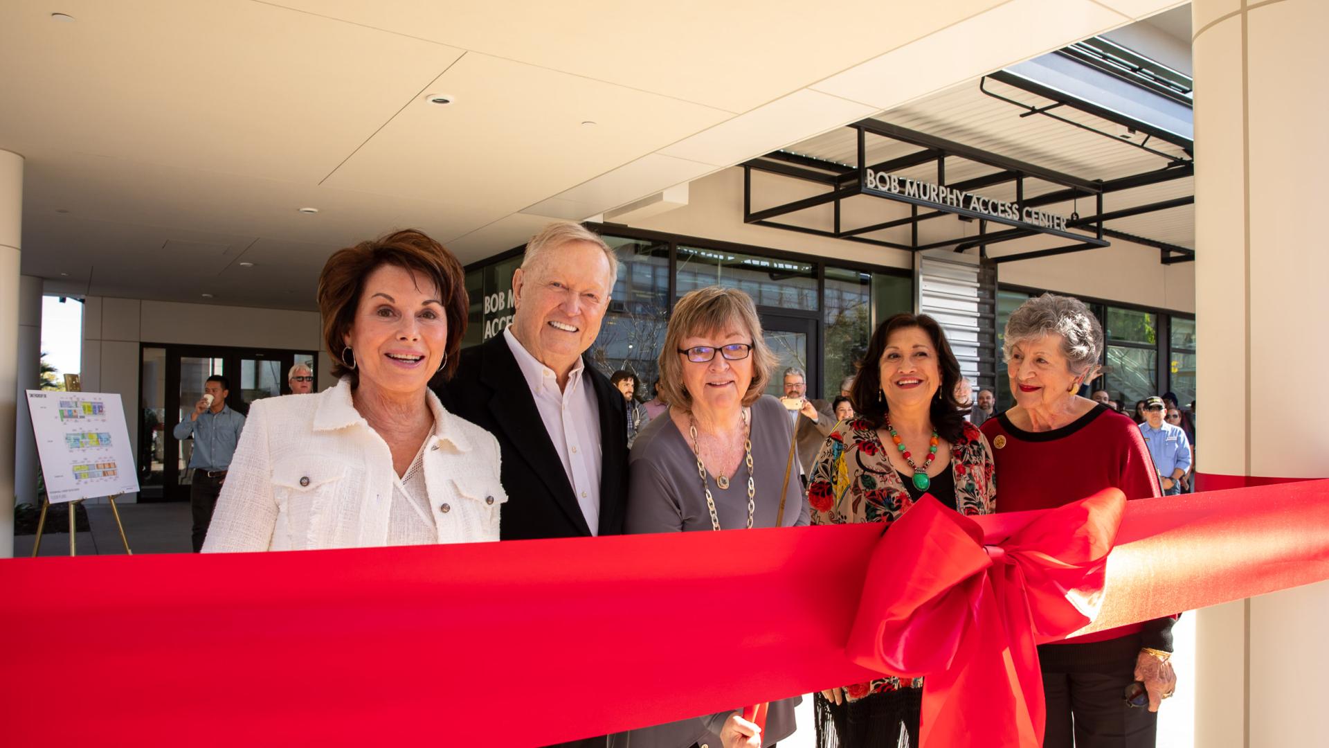 President Conoley, others behind Red Ribbon President Conoley, others behind Red Ribbon