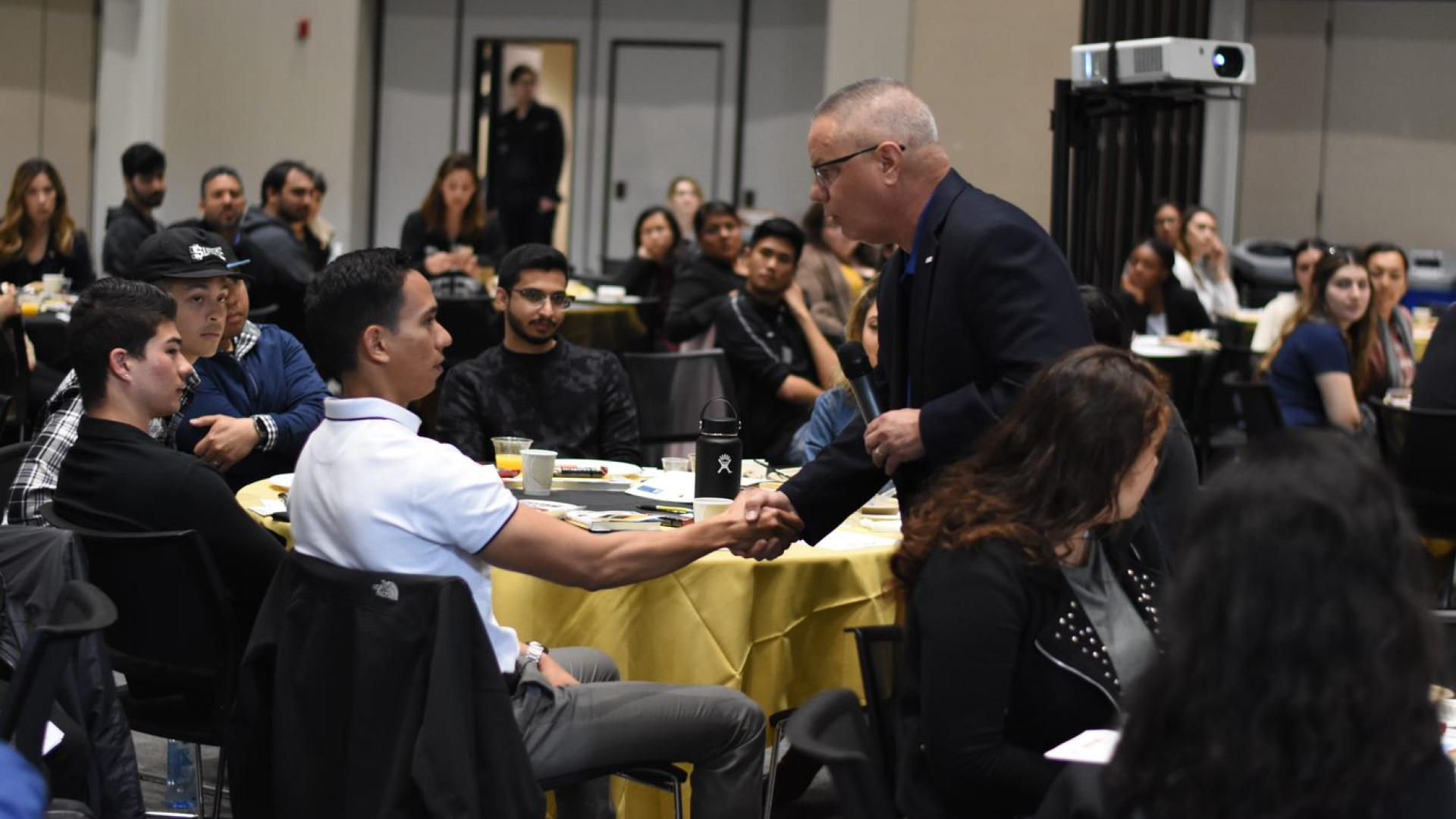 COB 2019 Ethics at the Beach connections shaking hands