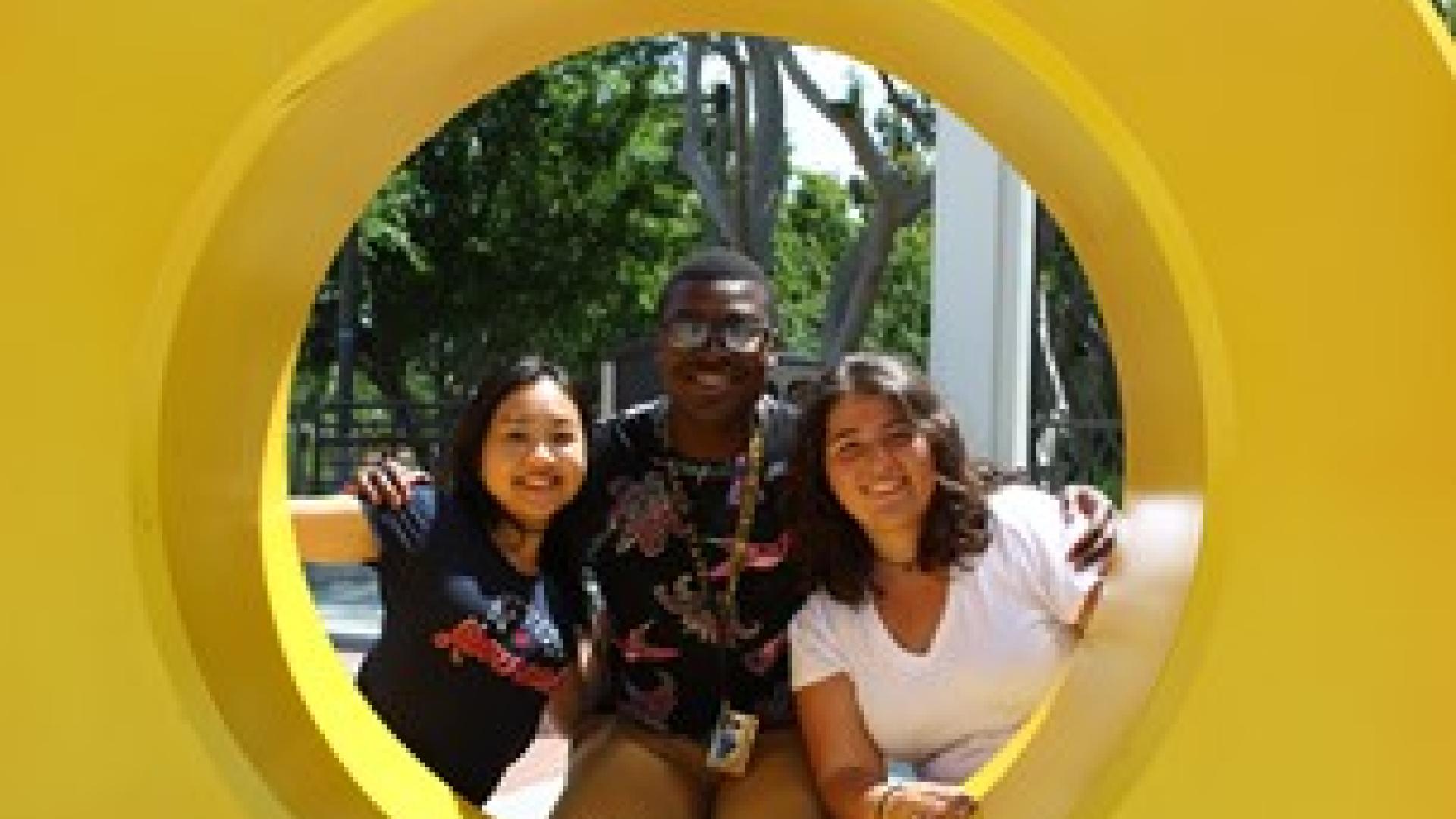 With friends at the GO BEACH sign (2019)