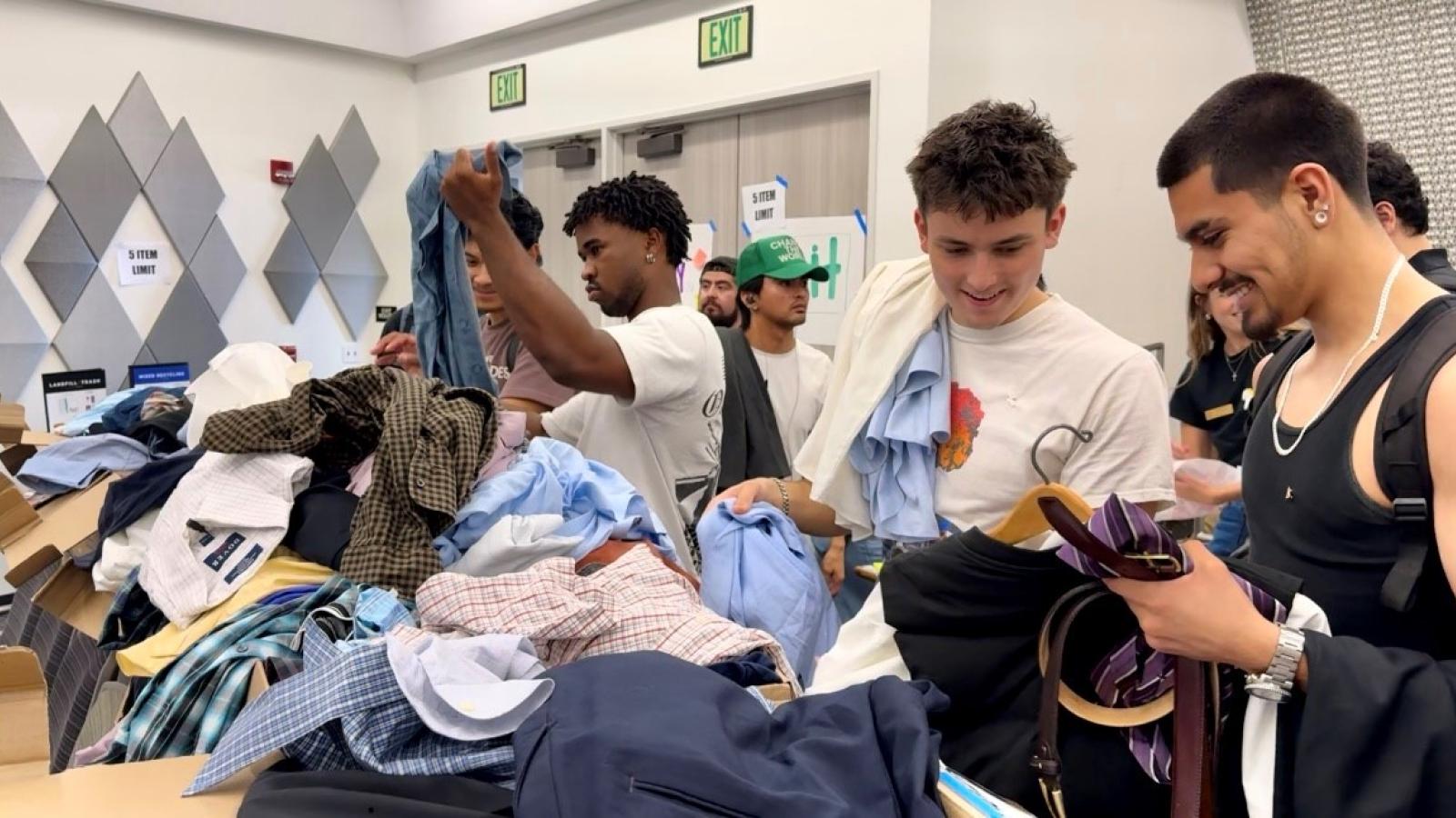 People trying on clothing