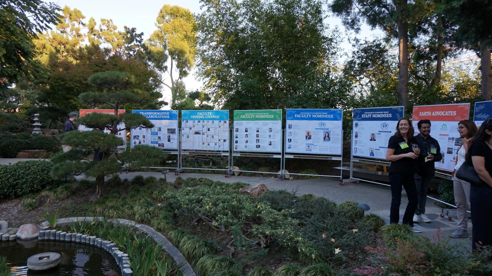 recognition boards outside with trees and nature