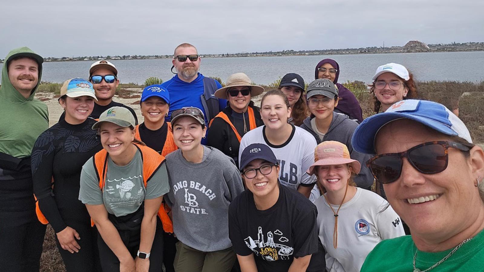 Christine Whitcraft and student researchers in the field