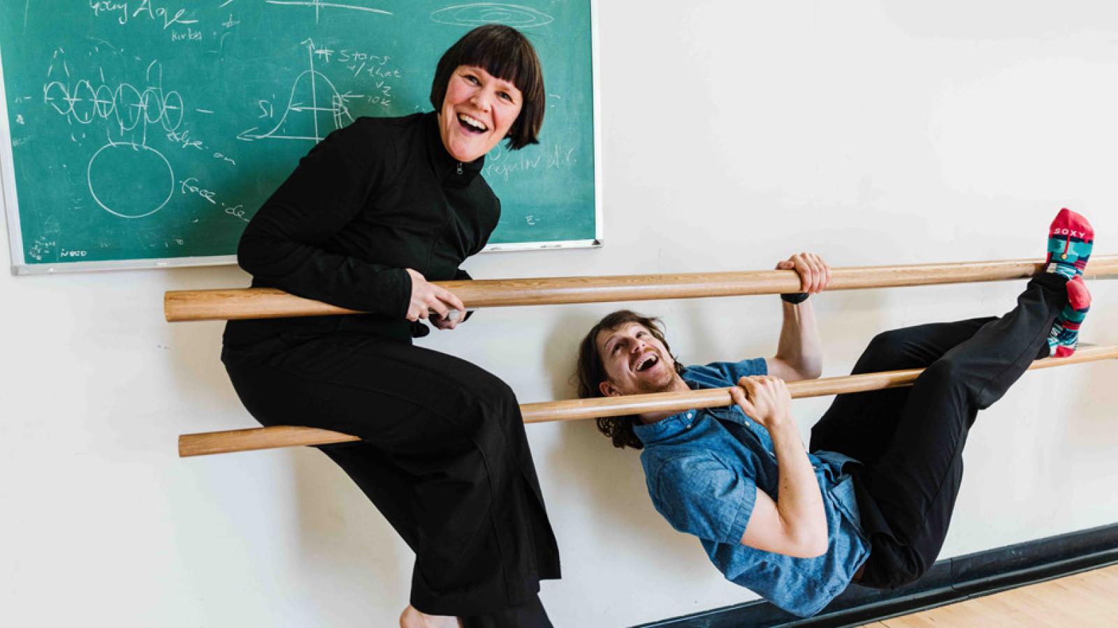 Rebecca Bryant and Joel Zinn having fun on ballet barres