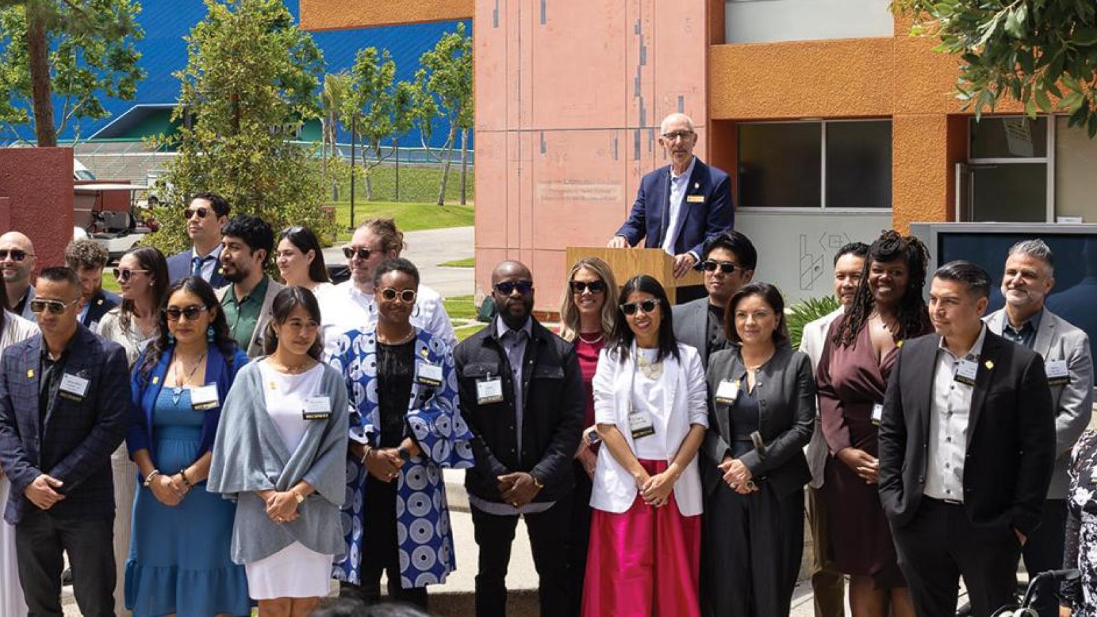 group of 2026 49 under 49 recipients posing for a photograph