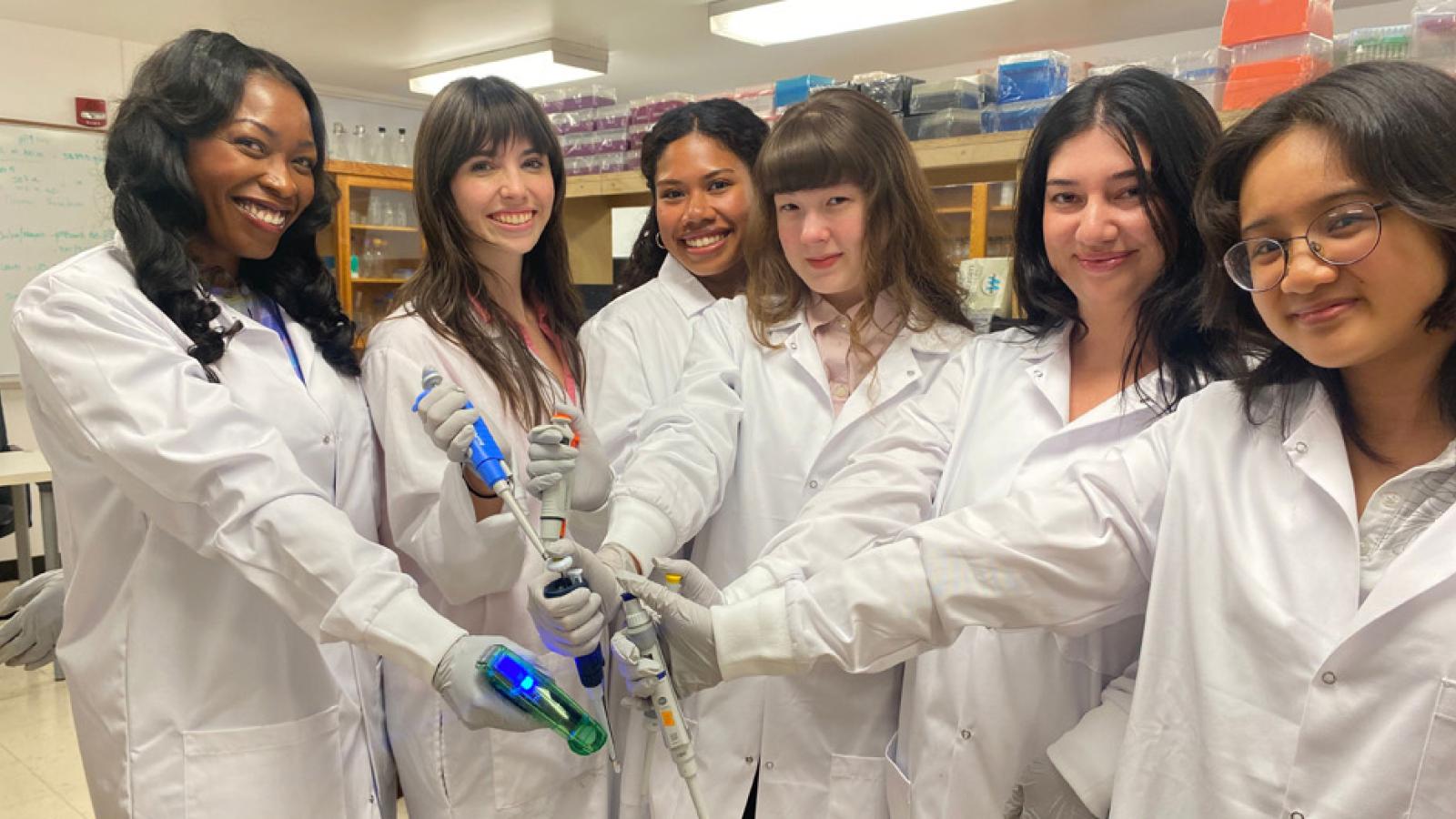 Dr. Lamar Thomas and student researchers in the lab