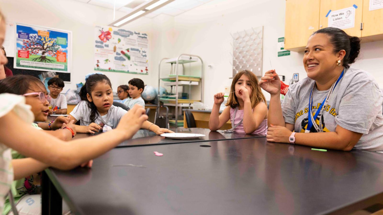 student teacher with young learners