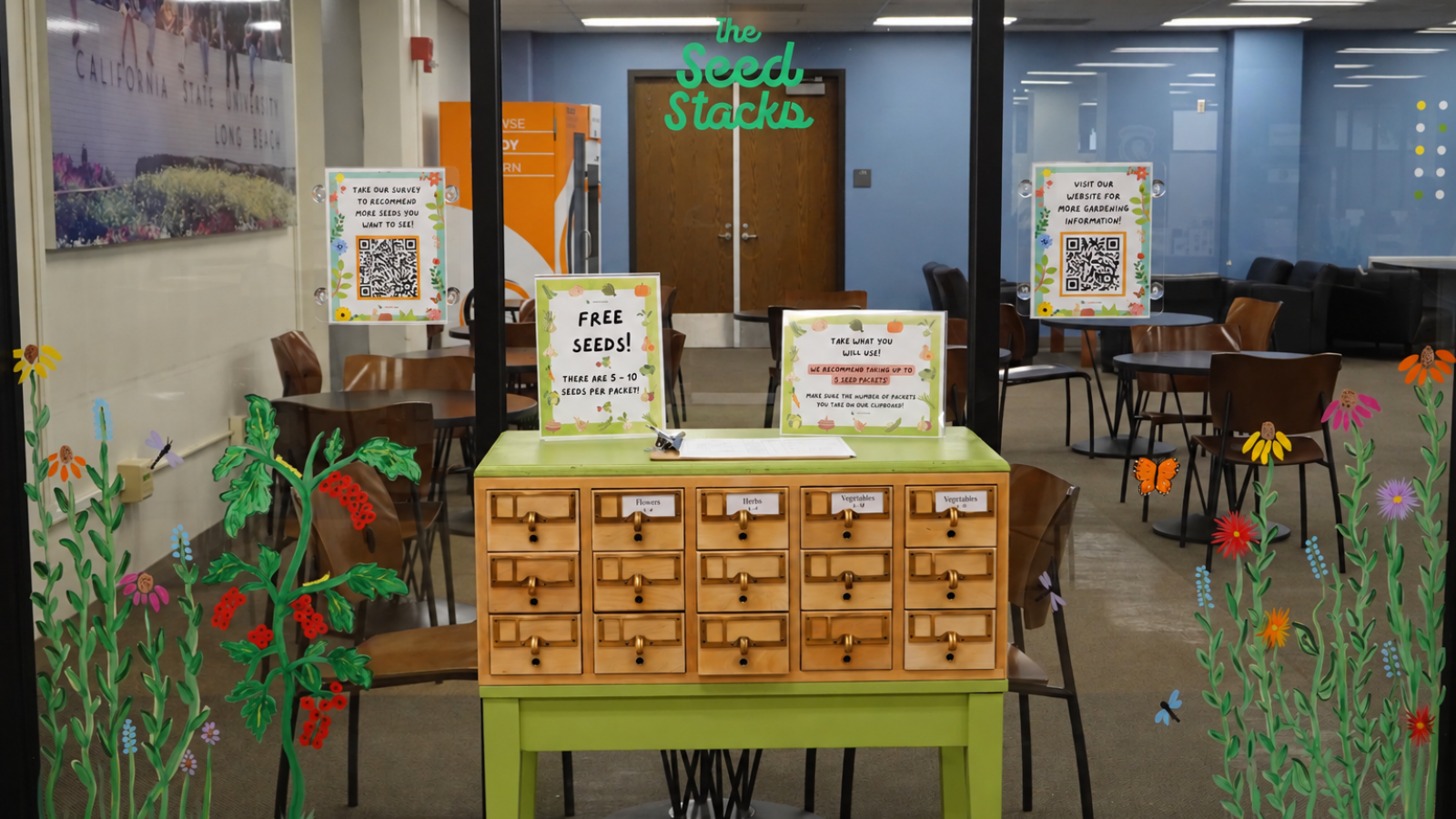 Picture of Seed Stacks card catalog with painted flowers in the background
