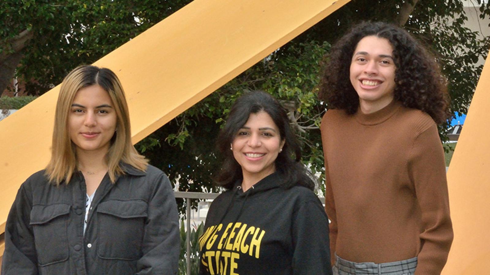 Deepali Bhandari and students Nishi Rauth and Miguel Palma