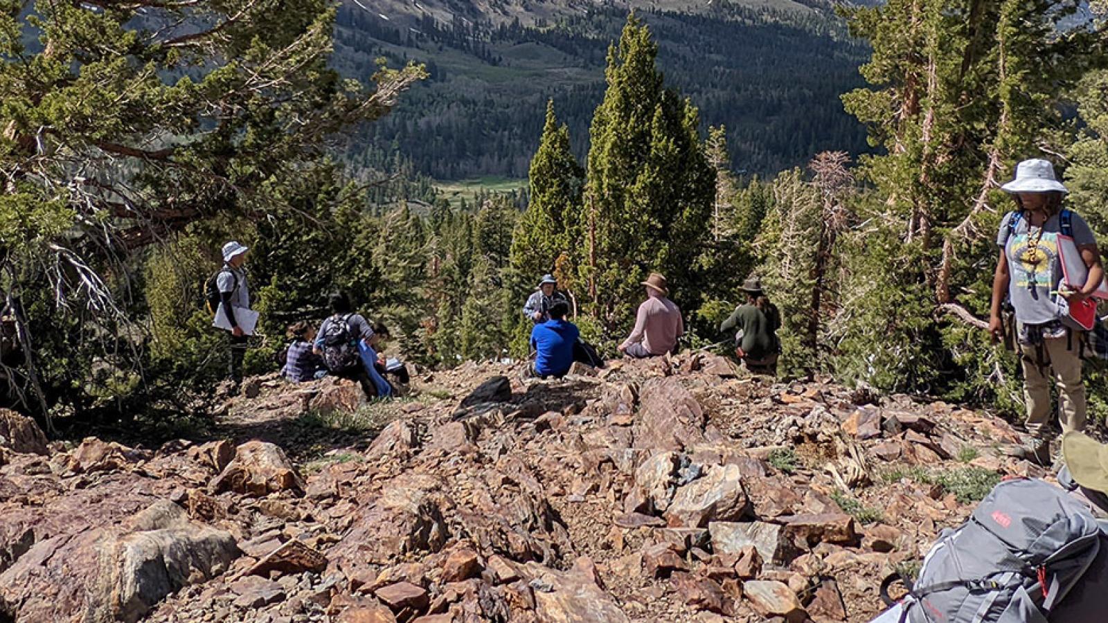 Students explore rocky area