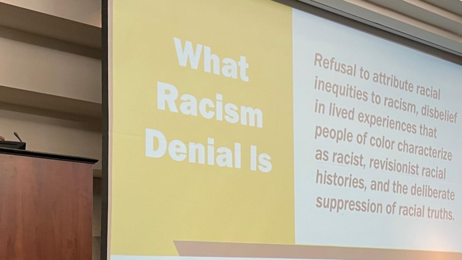 Shaun Harper gives a lecture in a conference center