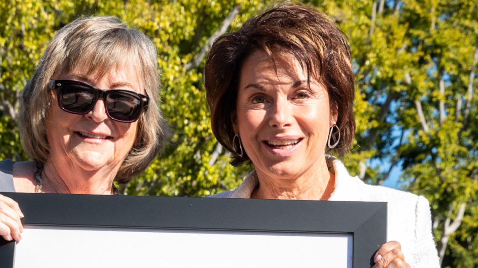 Jane Close Conoley and Louise Ukleja hold photo