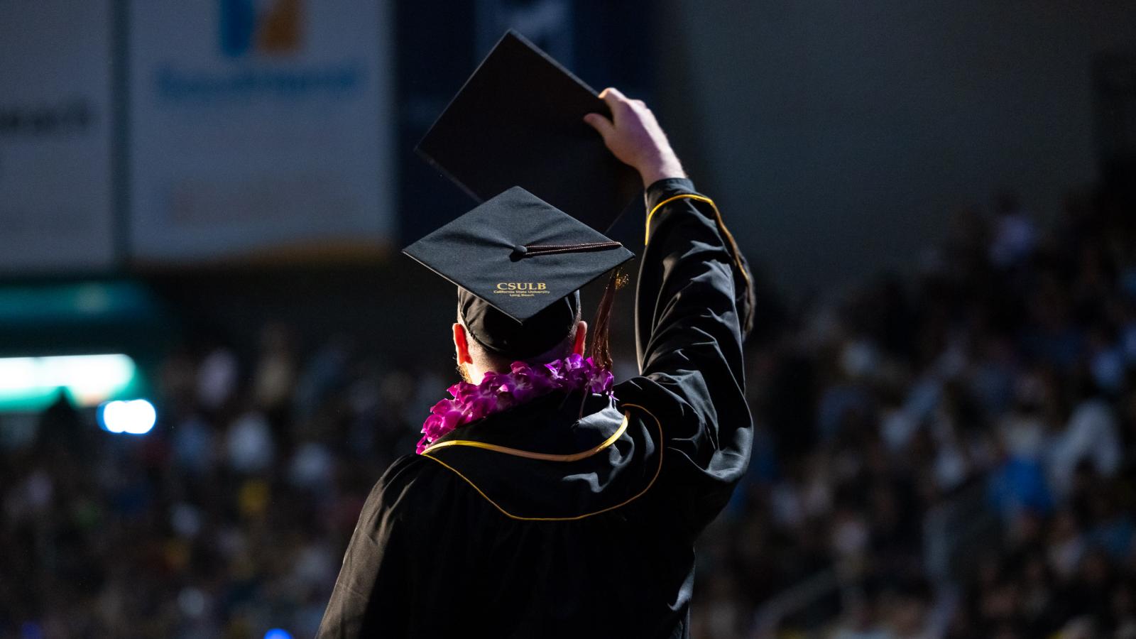 Graduating student facing crowd