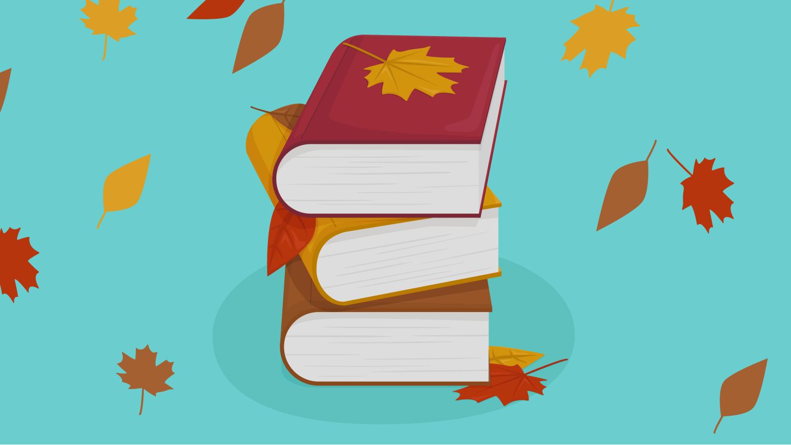 A stack of three textbooks with leaves falling