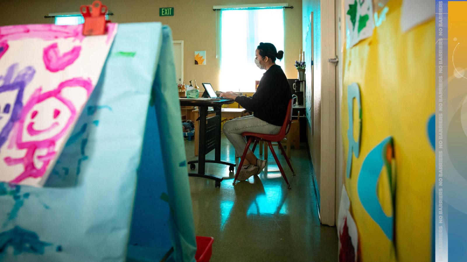 Teacher sitting in a classroom