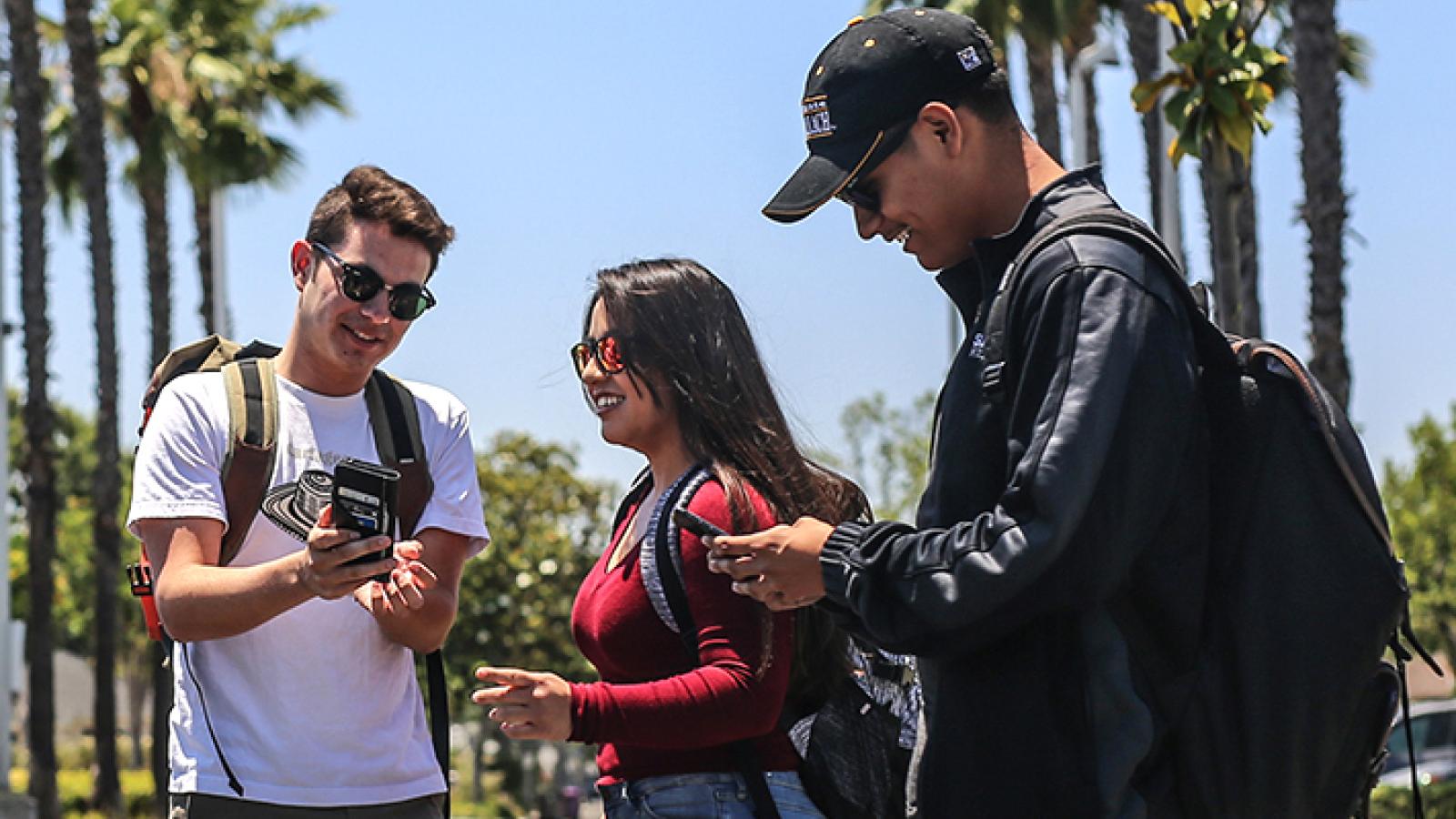 Students looking at phones