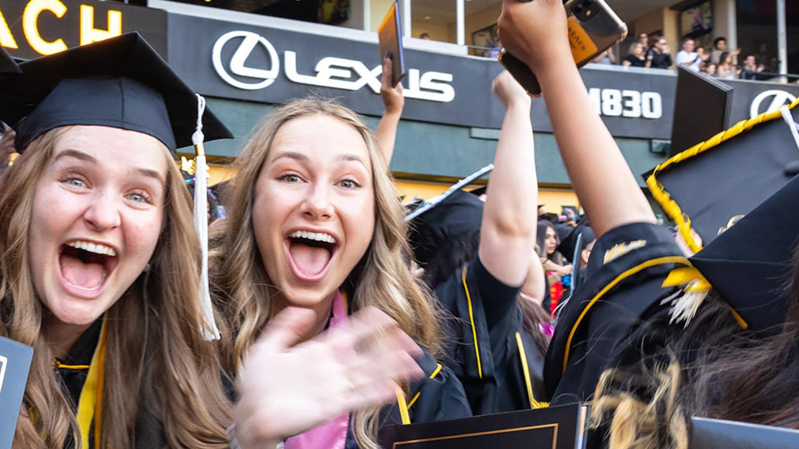 Students celebrating graduation.