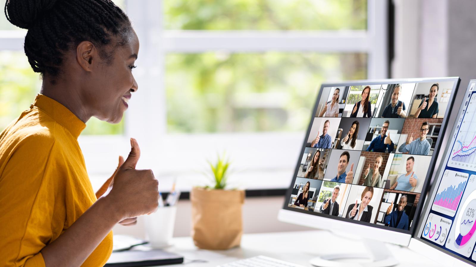woman looking at computers