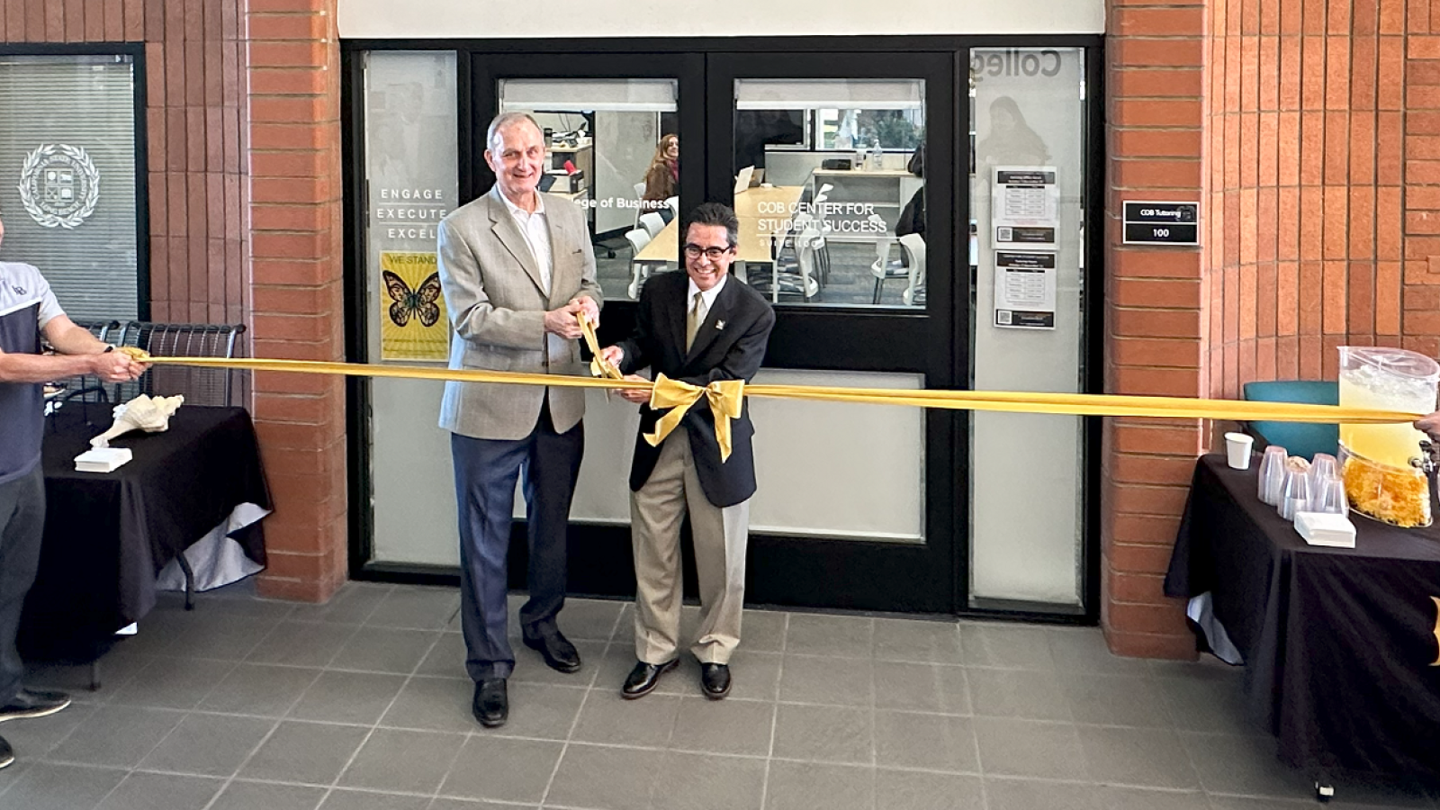 COB CSS New office ribbon cutting deans sauszo cutting ribbon