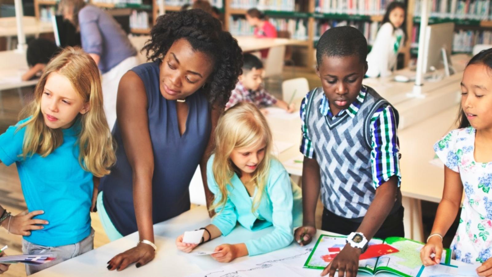 A teacher with students