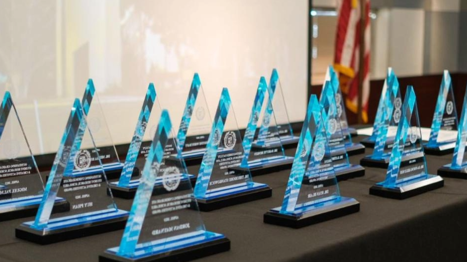 Achievement awards laid out on a table.