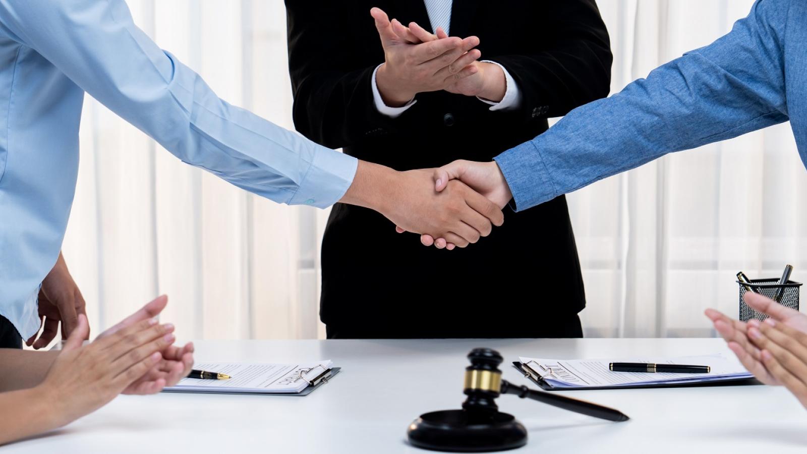 Handshake with Law indicated