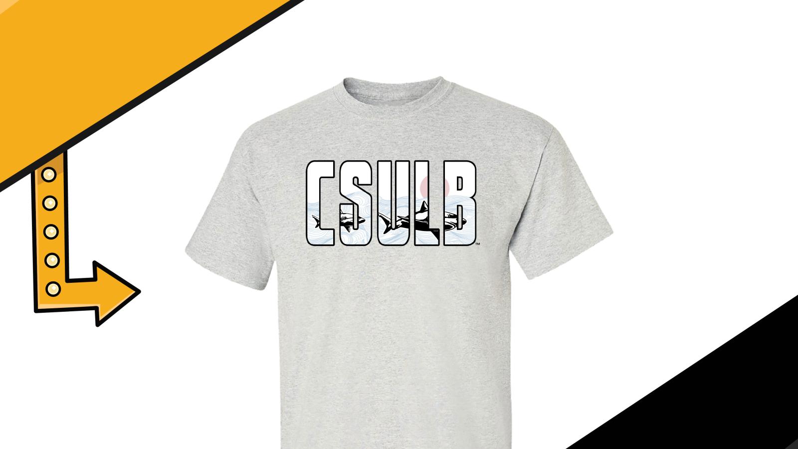 Light gray T Shirt with CSULB written on the front, where the letters are transparent so it looks like a window to under the sea where you can see two sharks swimming and a sunset over the water. 