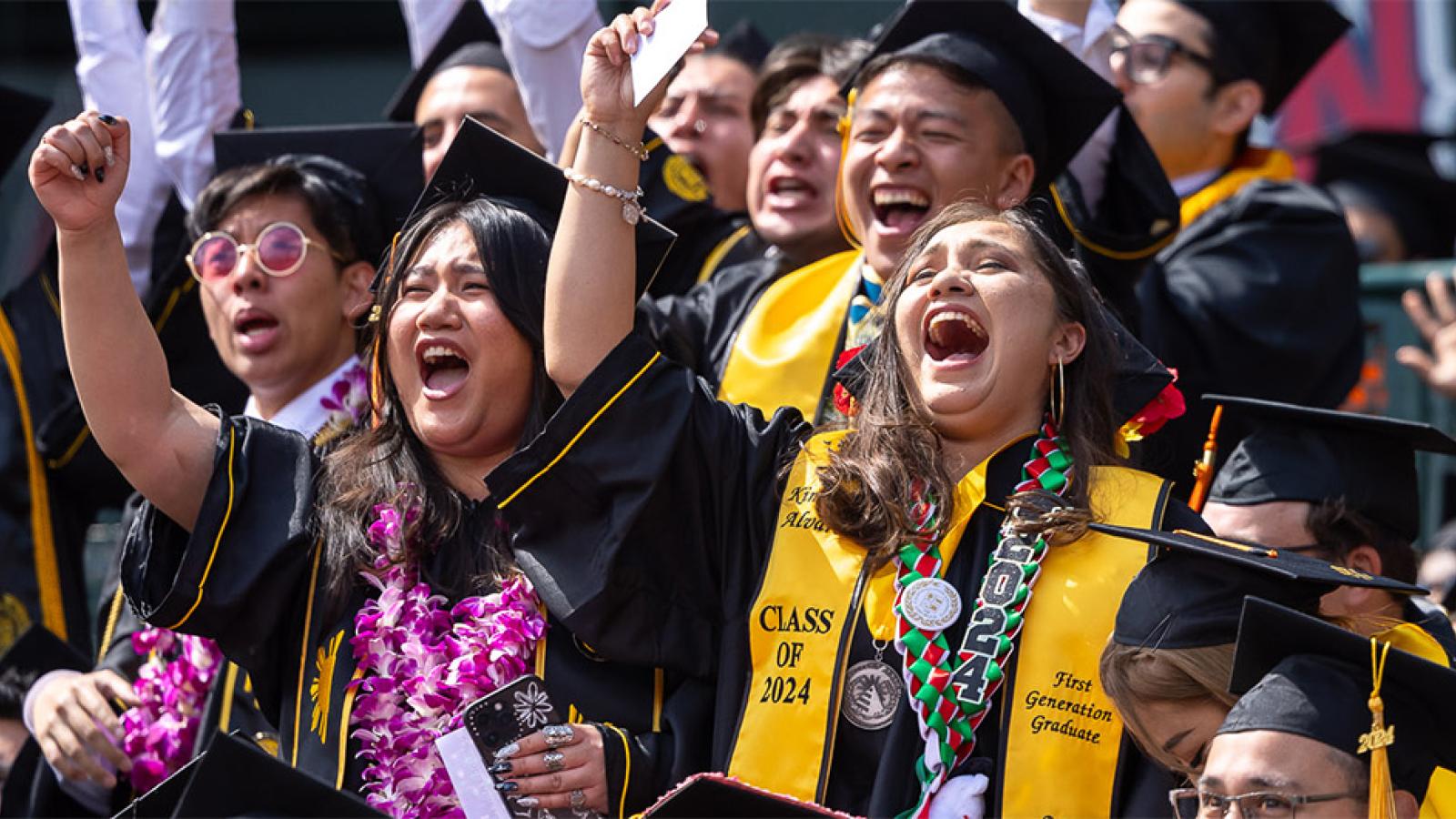 students celebrating at commencement