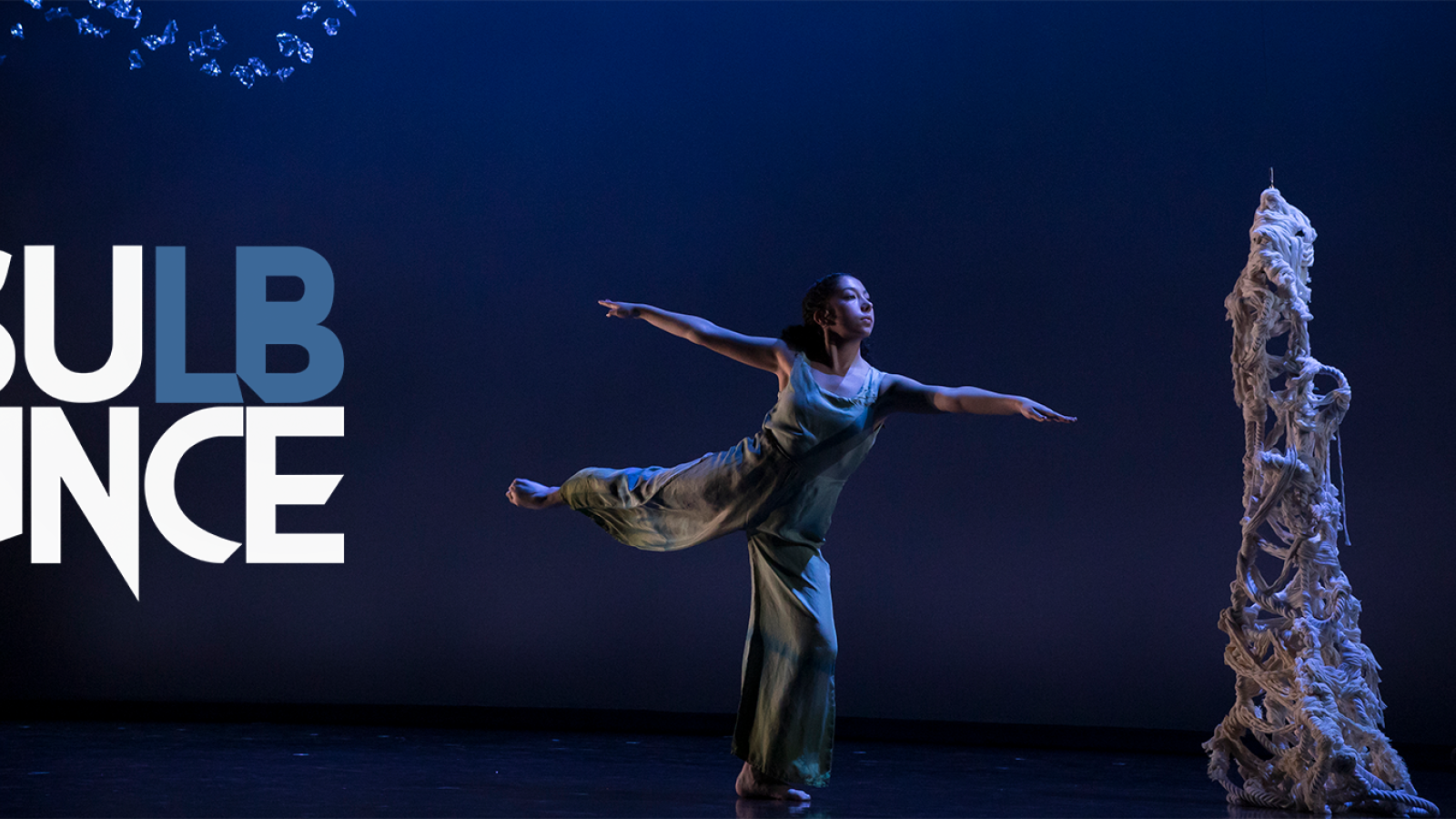 CSULB Dance logo next to a dancer performing on stage