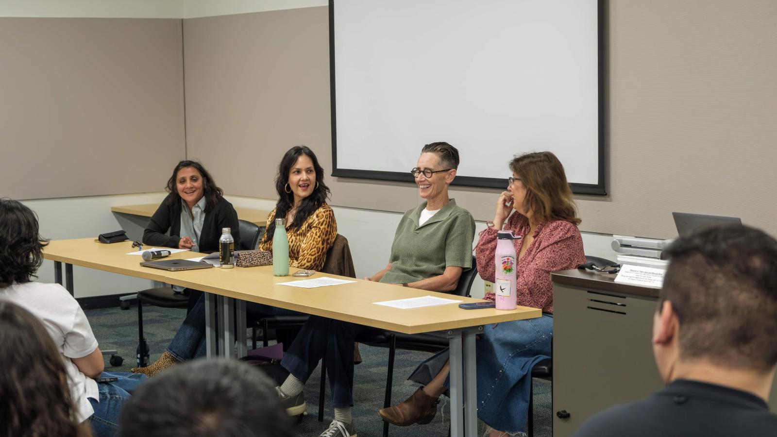 Dr. Reed, Dr. Koshy, Dr. Macias and Dr. Baralt on a panel