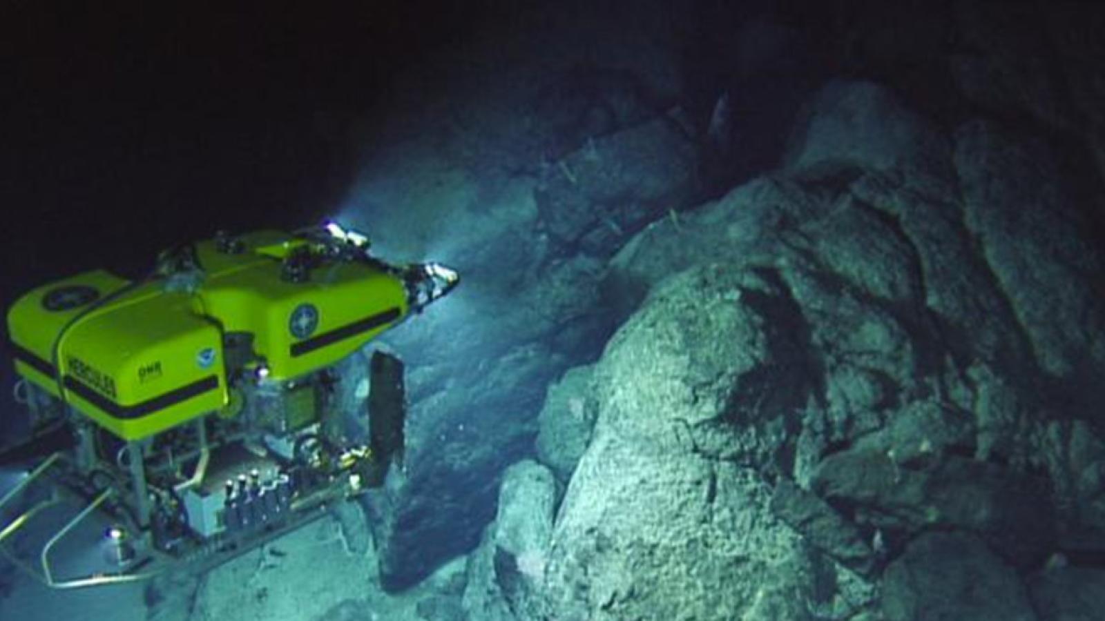remote-operated submersible exploring underwater geologic formations