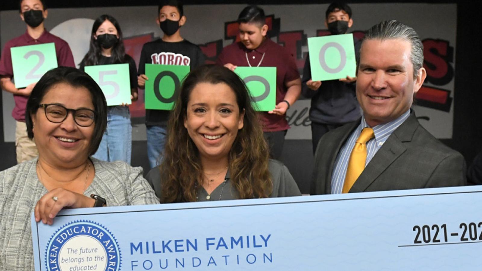 Angelica Gunderson receiving award. Photo credit Milken Family Foundation