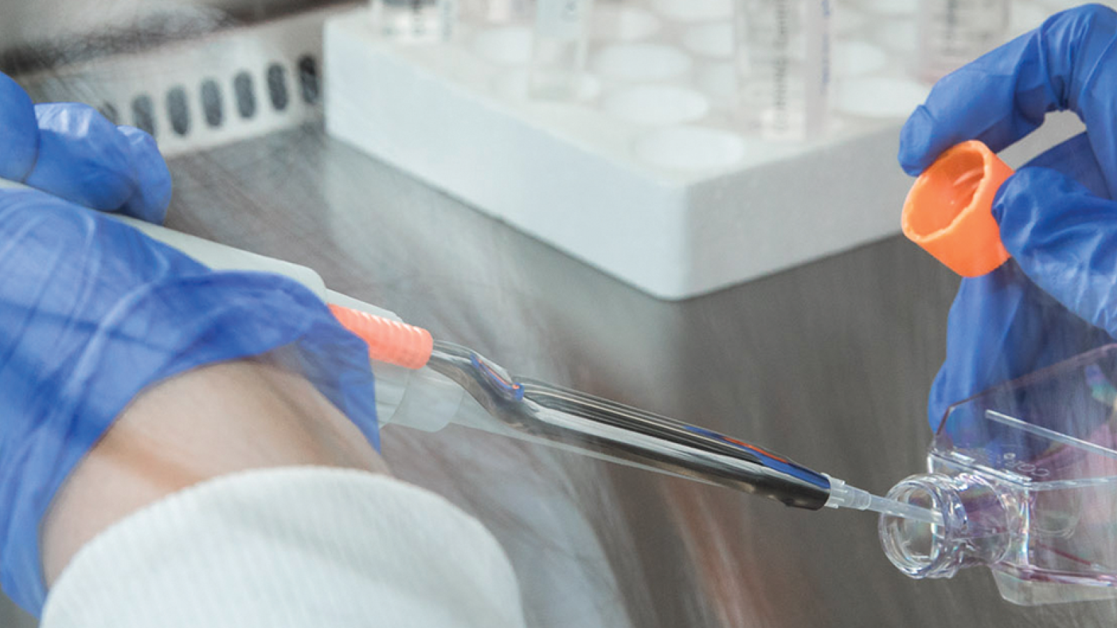 pipetting a liquid in a container