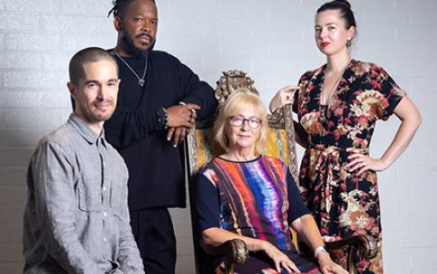Illustration Professor Robin Richesson sits in the center, surrounded by her former students