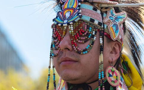 Man dressed in Native American attire