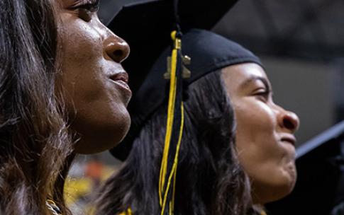 Two Black female students looking forward