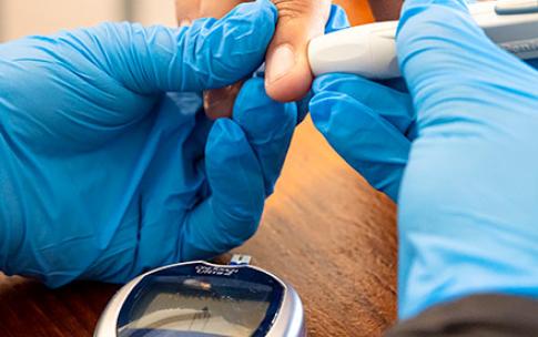 Student nurse draws blood