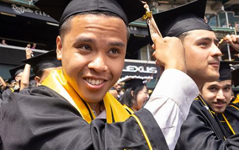 Graduate moves over tassel