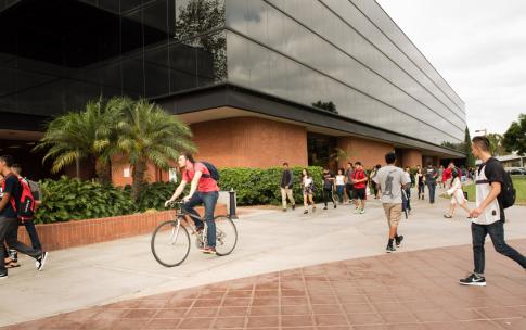 students passing the College of Business