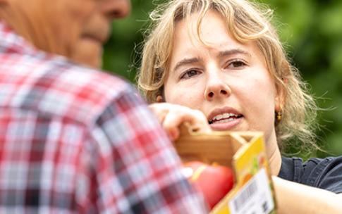 Hailey Wesling grabs produce