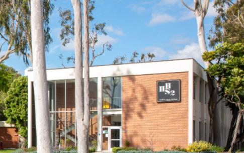 The Health and Human Services 2 building, with a brick and glass exterior