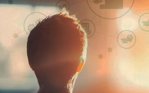 The back of a person's head superimposed over several graphics symbolizing different professions
