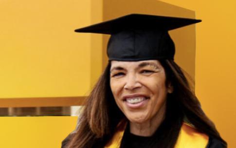 Ebony Tay in graduation regalia