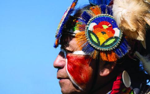A person wearing a traditional Native American headdress